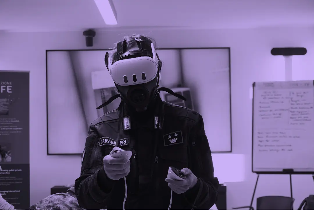 Carabinieri officer wearing an Almost Real CBRN mask and VR headset during an XR training session