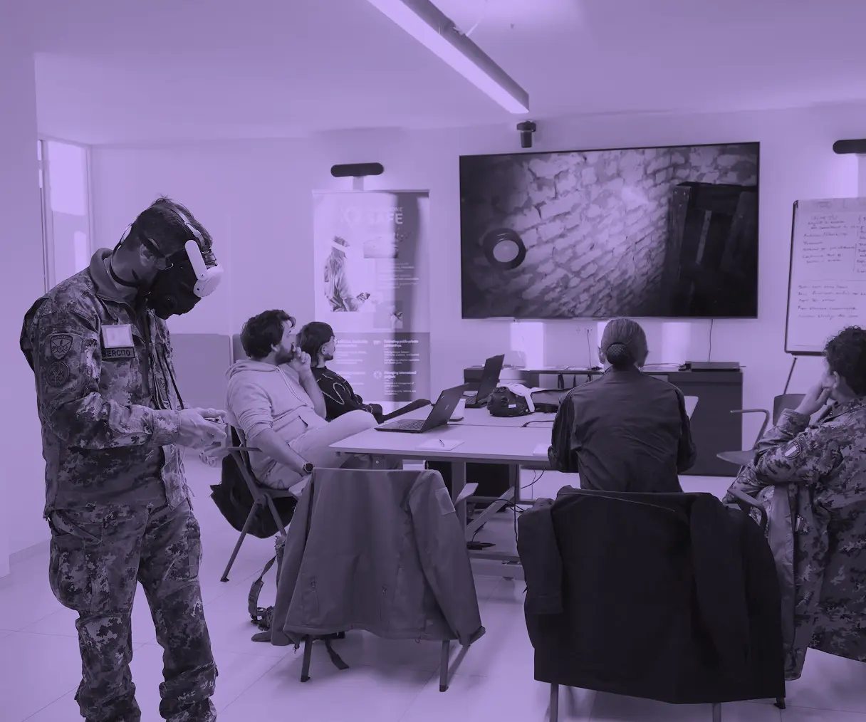 Military operators and technical staff during an Almost Real CBRN XR training session